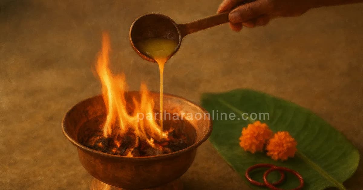 Small homam fire in a copper vessel with ghee poured from a ladle, child's bangles and flowers nearby — ayushya homam | pariharaonline.com