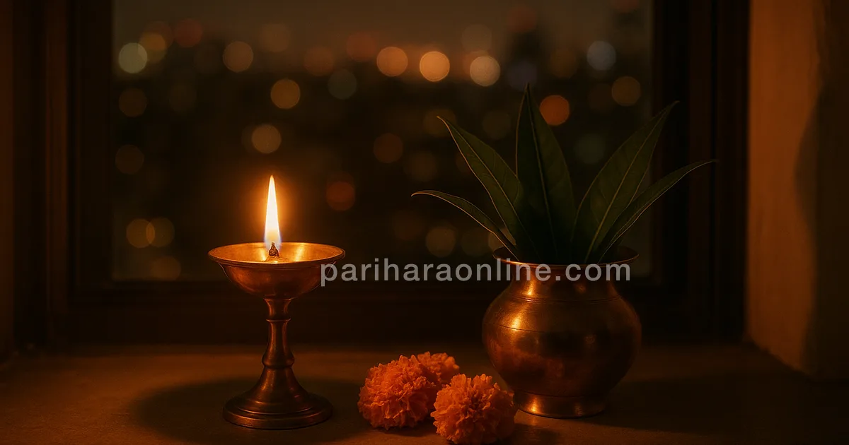 A brass lamp and a kalash with mango leaves lit for Navratri on a city apartment windowsill — how to celebrate navratri in the usa | pariharaonline.com