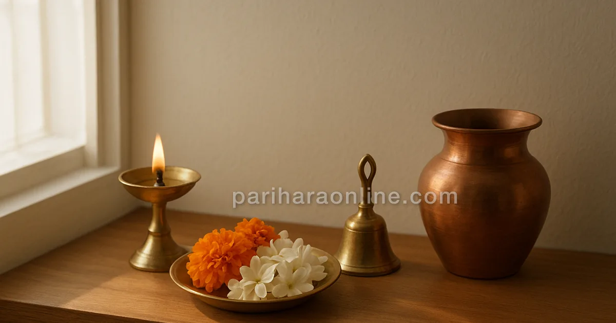Home altar with brass lamp, bell, flowers and copper water vessel in soft morning light — puja at home step by step | pariharaonline.com