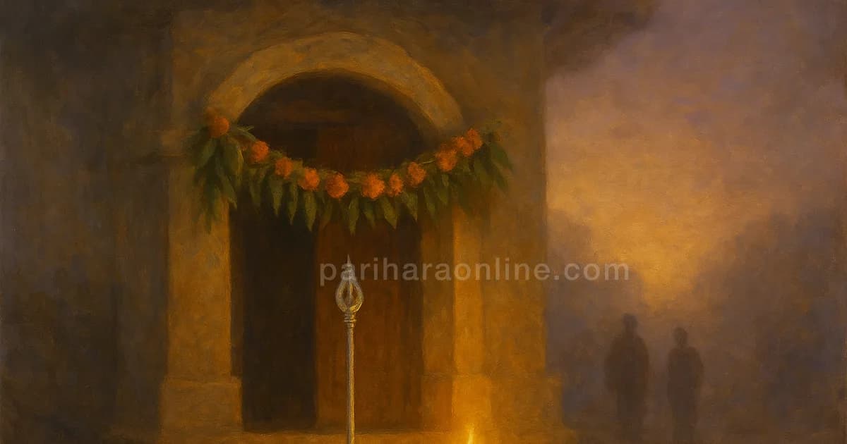 Mango-leaf archway over a temple door with a silver vel and lit lamp, symbols of Vishakha nakshatra and Murugan | pariharaonline.com